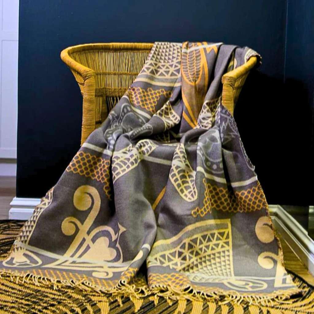 Lifestyle view of the Basotho Throw Iron/Bone 1