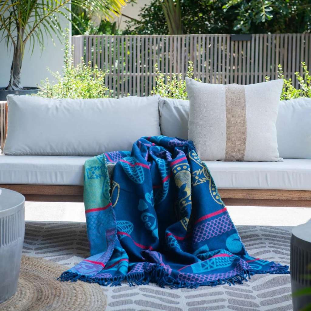 Lifestyle view of the Basotho Throw Navy/Aquamarine 1