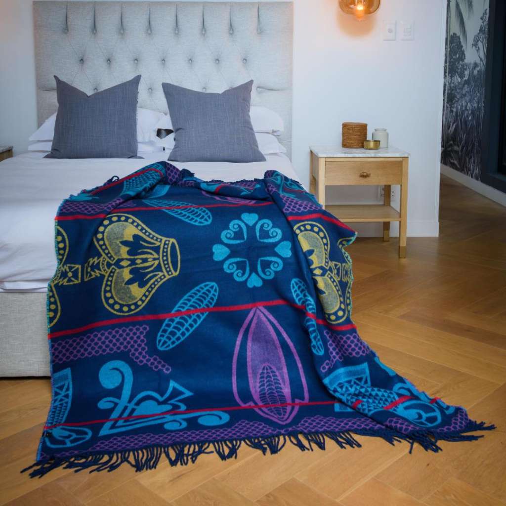 Lifestyle view of the Basotho Throw Navy/Aquamarine 2