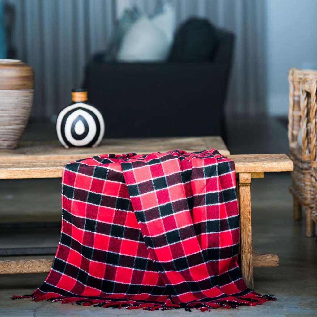 Lifestyle image of the Maasai Throw | Red/Black