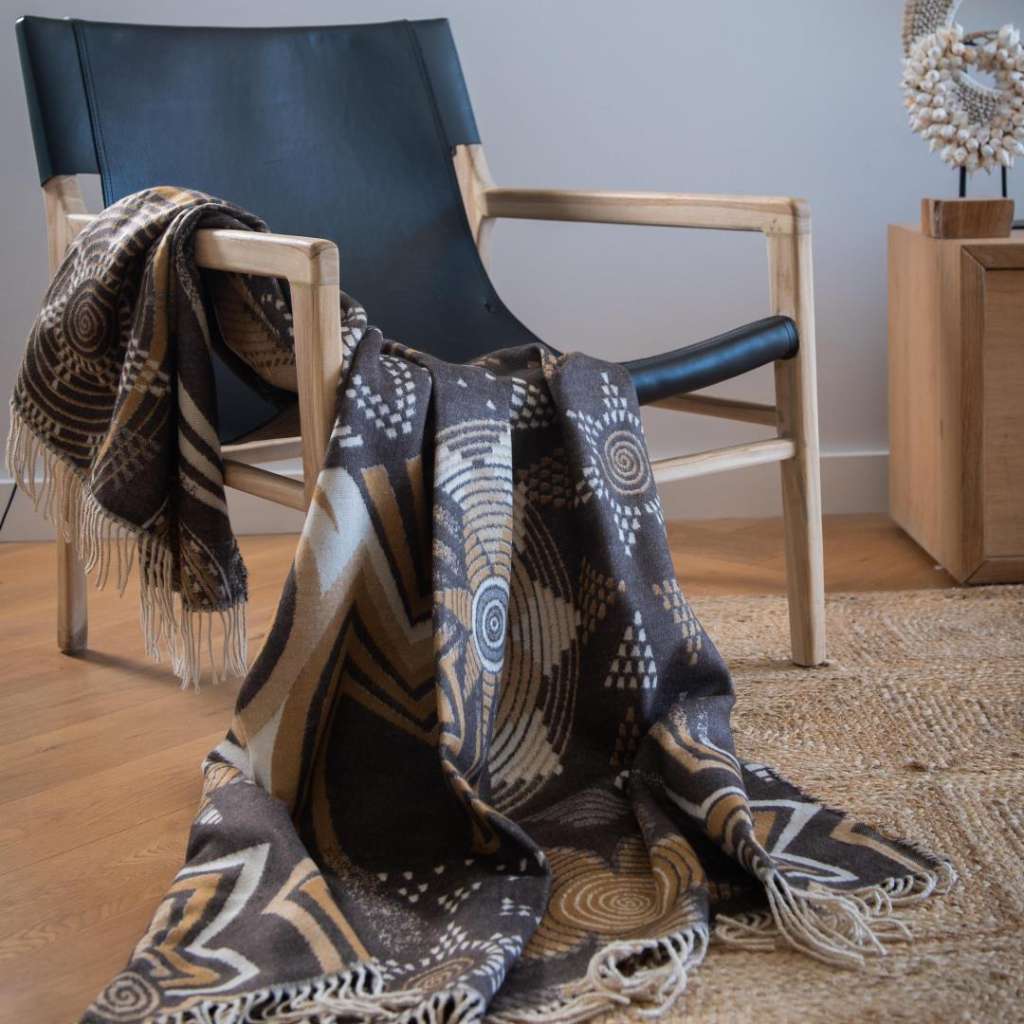 Lifestyle image of the Rwanda Throw Cocoa/Leather